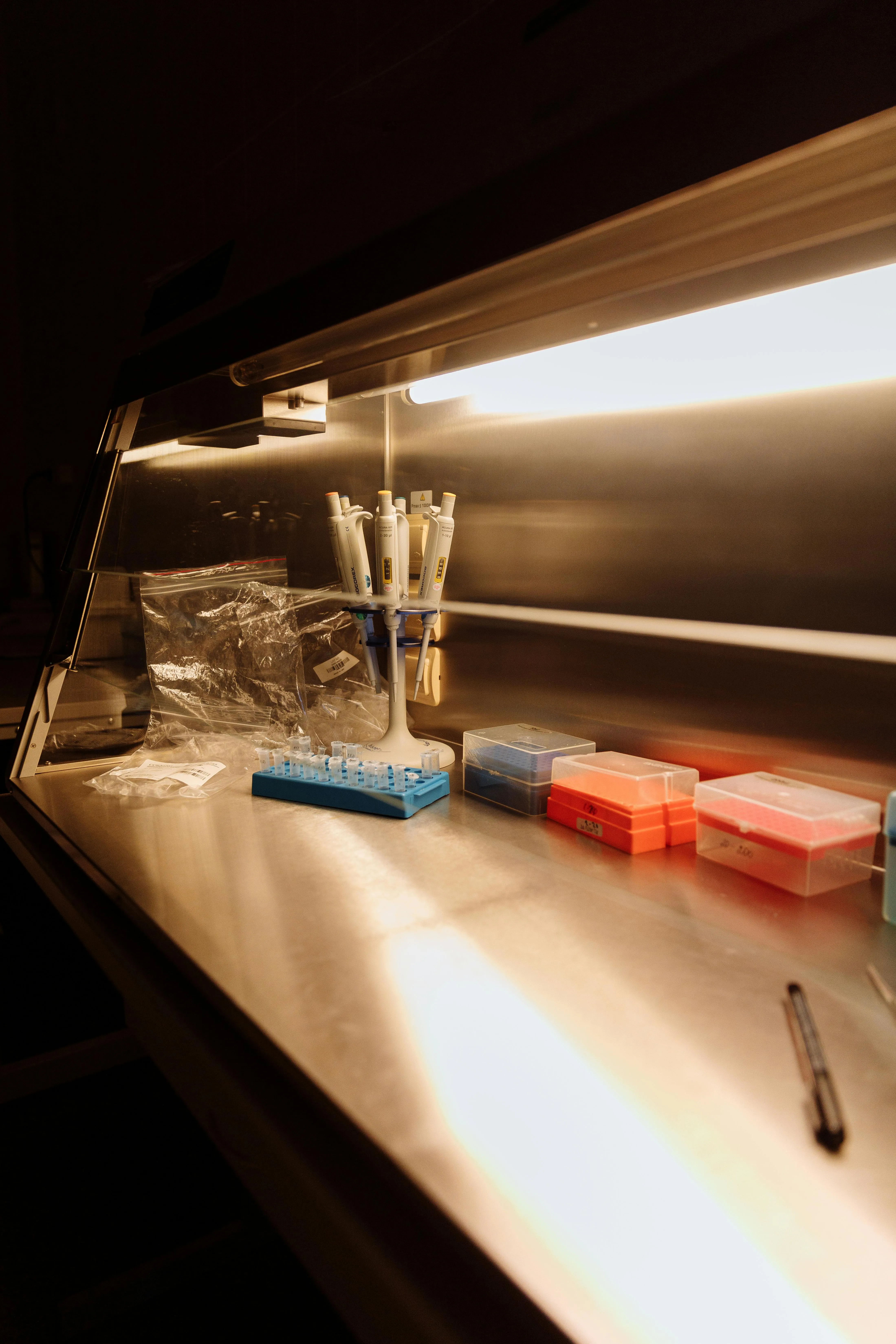 Third-party QC bench — pipettes and sample vials for palm olein analysis